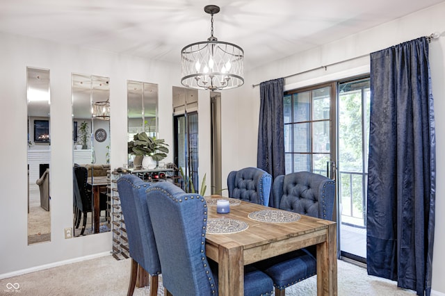 2206 Boston Ct Unit B, Indianapolis, IN 46228 - dining area featuring a chandelier and light carpet