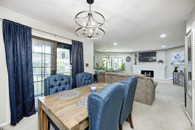 2206 Boston Ct Unit B, Indianapolis, IN 46228 - dining area featuring a chandelier, light colored carpet, recessed lighting, and plenty of natural light