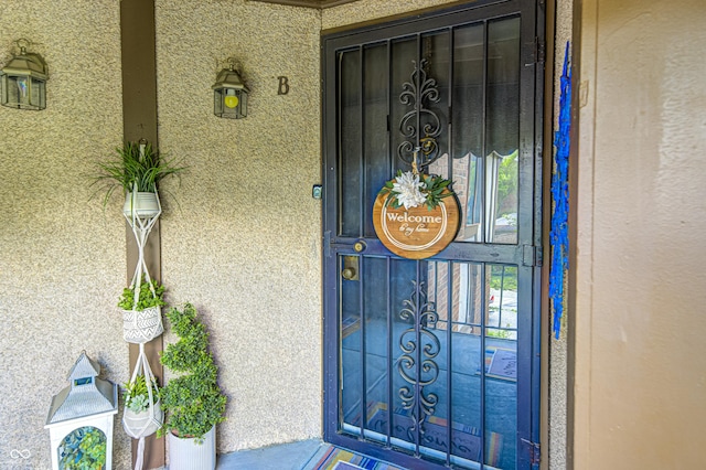 2206 Boston Ct Unit B, Indianapolis, IN 46228 - doorway to property with stucco siding