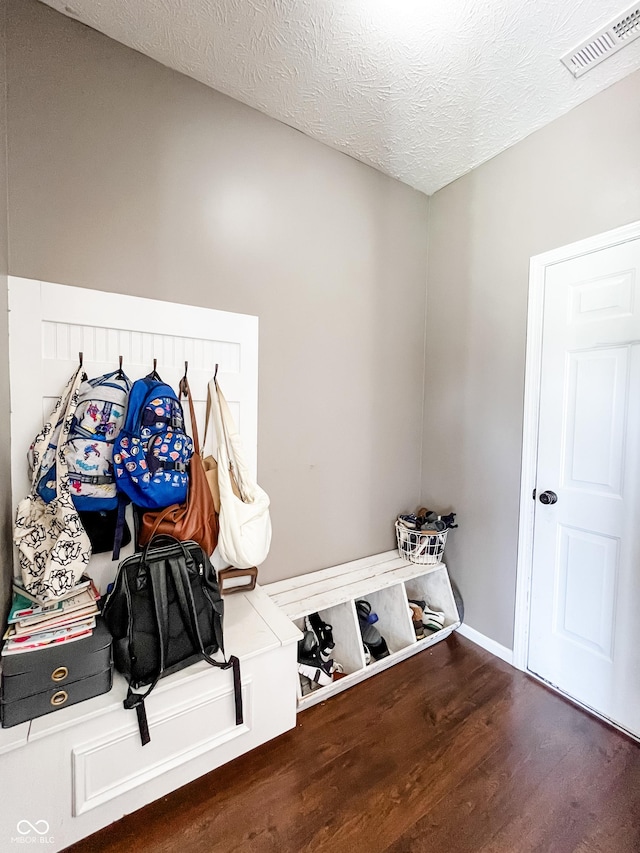 258 Center Ln, Crawfordsville, IN 47933 - mudroom with wood finished floors and a textured ceiling