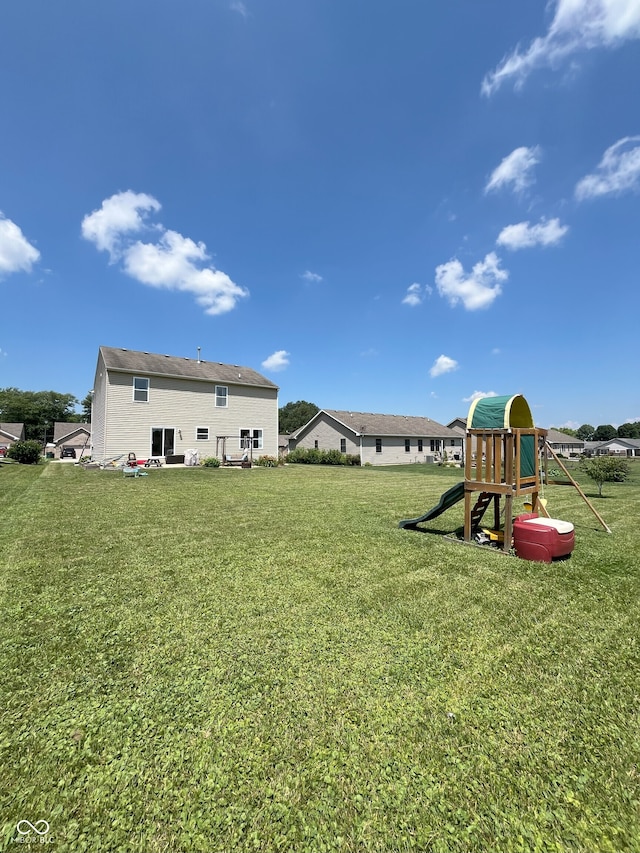 258 Center Ln, Crawfordsville, IN 47933 - view of grassy yard with a playground