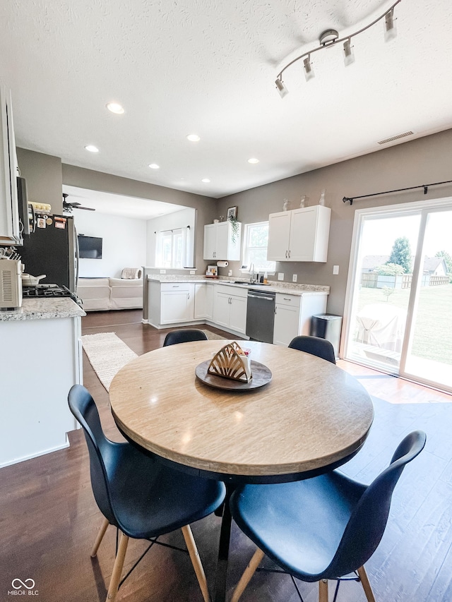 258 Center Ln, Crawfordsville, IN 47933 - dining area featuring dark wood finished floors, recessed lighting, and a textured ceiling