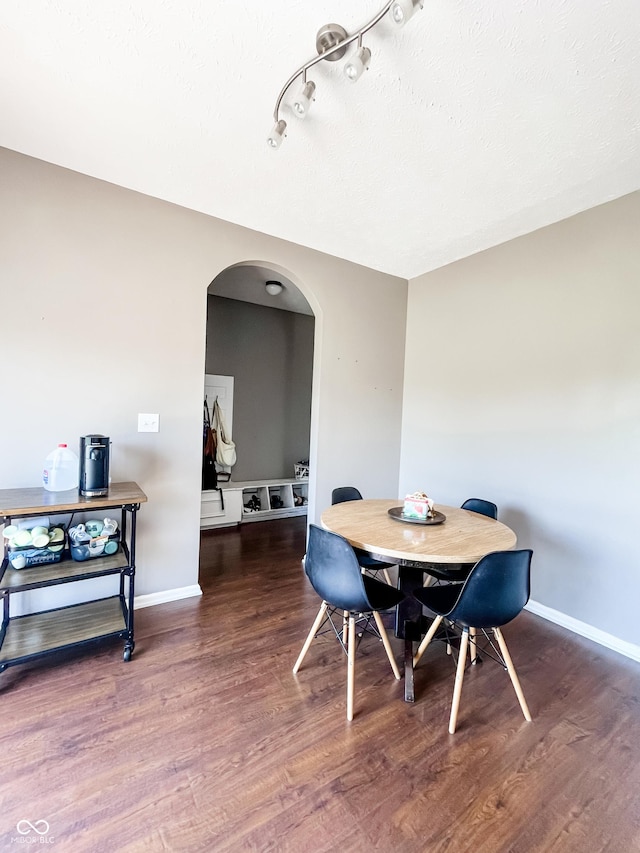 258 Center Ln, Crawfordsville, IN 47933 - dining room featuring arched walkways and wood finished floors