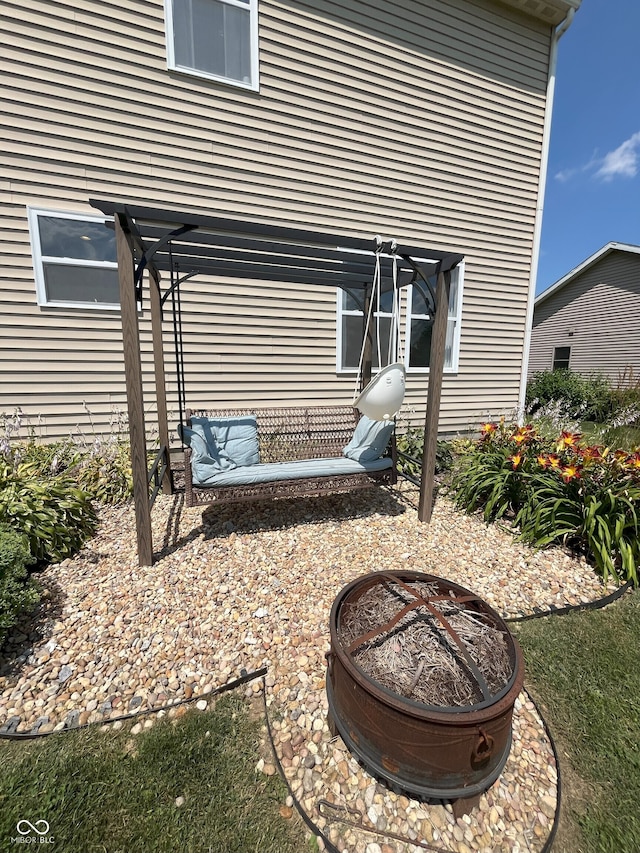 258 Center Ln, Crawfordsville, IN 47933 - view of patio / terrace with a fire pit and a pergola