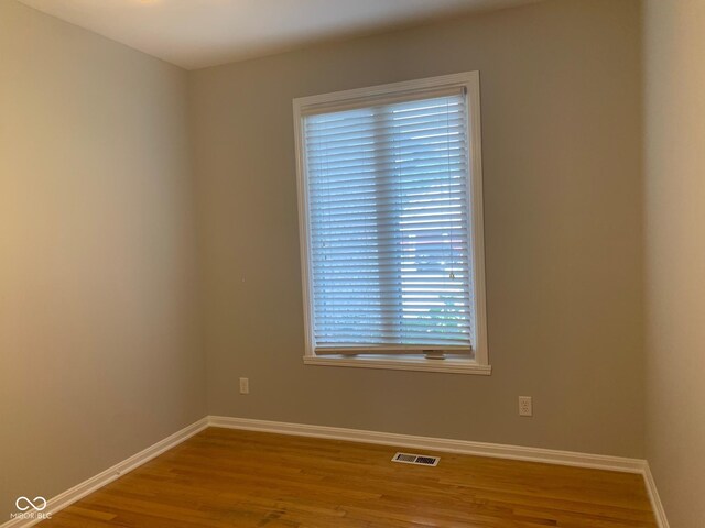 9532 Pinecreek Dr, Indianapolis, IN 46256 - spare room with wood finished floors and baseboards