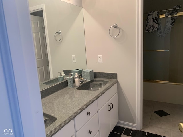 9532 Pinecreek Dr, Indianapolis, IN 46256 - bathroom with double vanity, tile patterned flooring, and washtub / shower combination