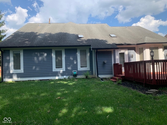 9532 Pinecreek Dr, Indianapolis, IN 46256 - rear view of house with a wooden deck, roof with shingles, and a yard