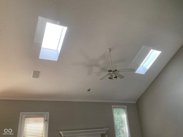 9532 Pinecreek Dr, Indianapolis, IN 46256 - detailed view of a skylight, ornamental molding, and ceiling fan