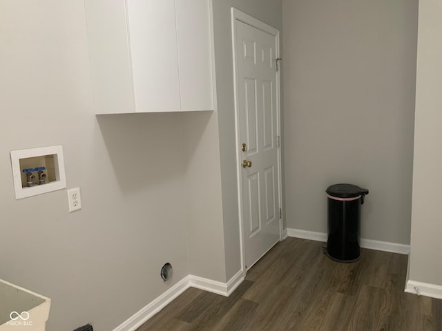 9532 Pinecreek Dr, Indianapolis, IN 46256 - laundry room with washer hookup, cabinet space, and dark wood-style floors