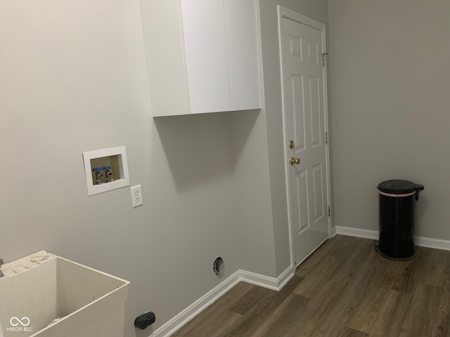 9532 Pinecreek Dr, Indianapolis, IN 46256 - laundry room featuring cabinet space, dark wood-style floors, and hookup for a washing machine