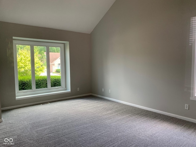 9532 Pinecreek Dr, Indianapolis, IN 46256 - unfurnished room featuring carpet floors and lofted ceiling