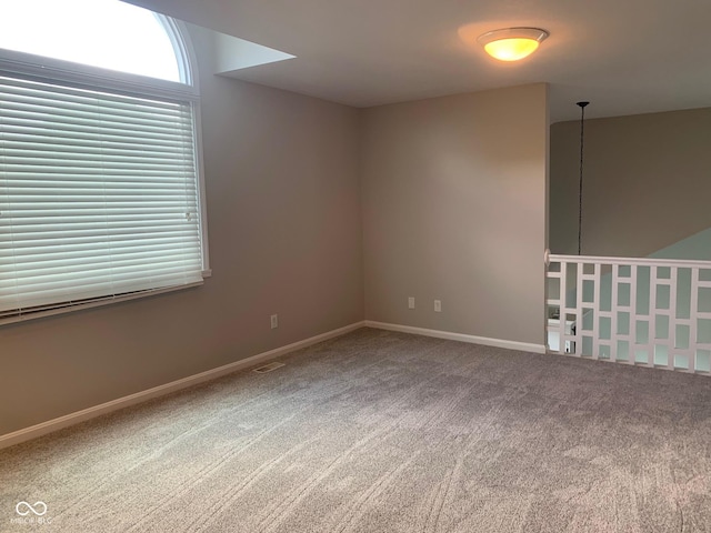9532 Pinecreek Dr, Indianapolis, IN 46256 - carpeted empty room with baseboards