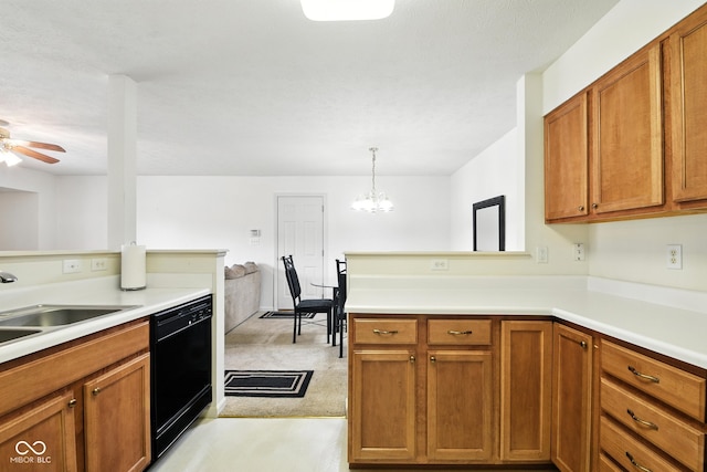 3096 Wildcat Ln, Indianapolis, IN 46203 - kitchen with black dishwasher, light countertops, brown cabinetry, and ceiling fan