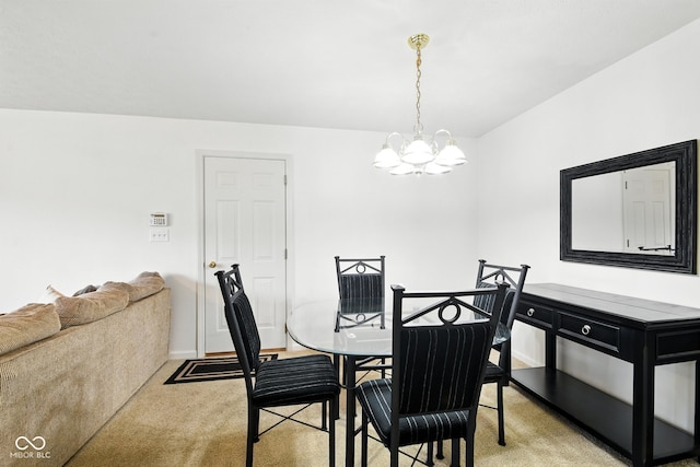 3096 Wildcat Ln, Indianapolis, IN 46203 - dining room with light colored carpet and a chandelier