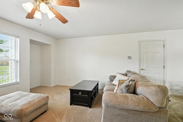 3096 Wildcat Ln, Indianapolis, IN 46203 - living room with light carpet, plenty of natural light, and ceiling fan