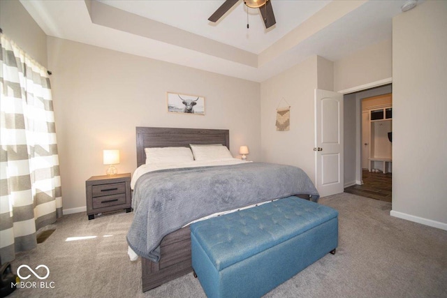 1615 N Blue Rd, Greenfield, IN 46140 - bedroom with carpet floors, a tray ceiling, and a ceiling fan