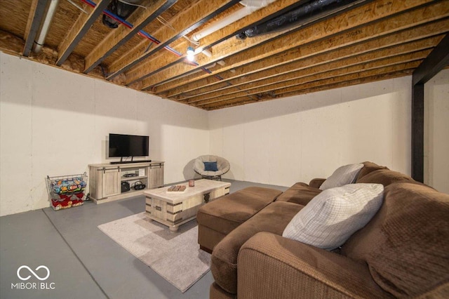 1615 N Blue Rd, Greenfield, IN 46140 - living area with concrete flooring