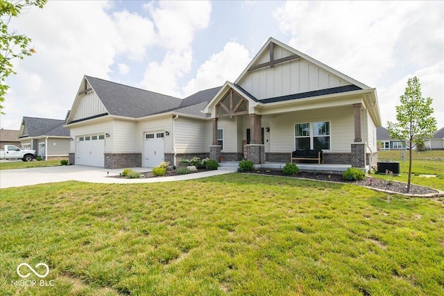 1615 N Blue Rd, Greenfield, IN 46140 - craftsman inspired home with board and batten siding, brick siding, an attached garage, driveway, and covered porch