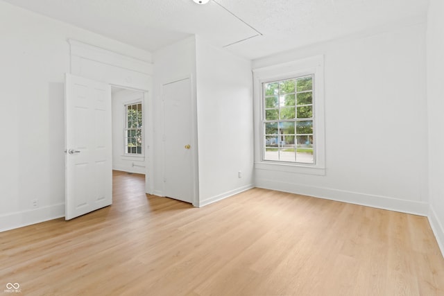 525 N Concord St N, Indianapolis, IN 46222 - empty room featuring light wood-style flooring