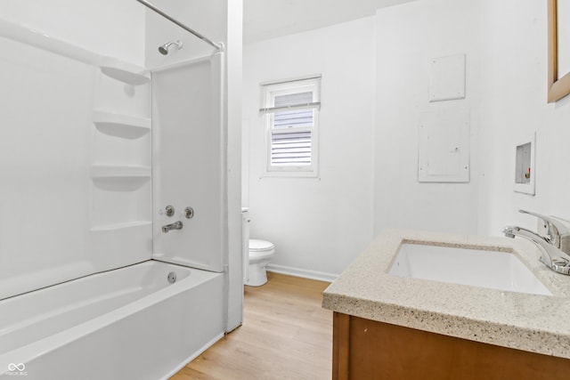 525 N Concord St N, Indianapolis, IN 46222 - bathroom with vanity, wood finished floors,  shower combination, and electric panel