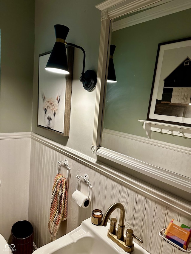 6209 N Parker St, Indianapolis, IN 46220 - bathroom view of a wainscoted wall and a sink