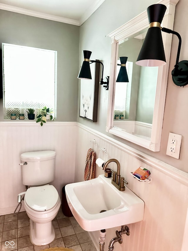 6209 N Parker St, Indianapolis, IN 46220 - bathroom with a wainscoted wall and ornamental molding