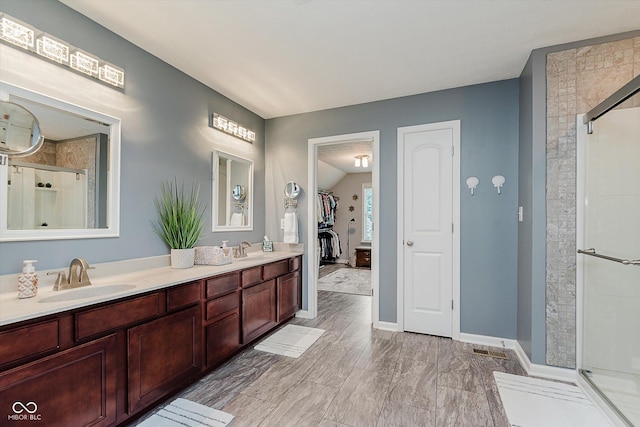 823 Colin Dr, Avon, IN 46123 - full bathroom with a shower stall, double vanity, and a walk in closet