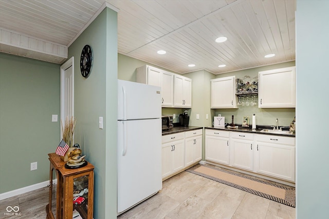 823 Colin Dr, Avon, IN 46123 - kitchen featuring freestanding refrigerator, dark countertops, recessed lighting, white cabinets, and stainless steel microwave