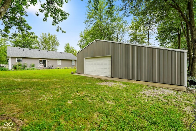 6020 E Smokey View Rd, Mooresville, IN 46158 - view of grassy yard with a detached garage and an outbuilding
