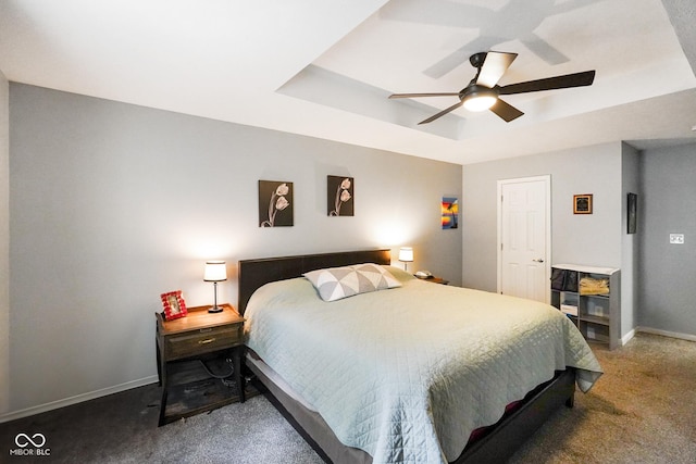6020 E Smokey View Rd, Mooresville, IN 46158 - bedroom with a tray ceiling, carpet, and ceiling fan