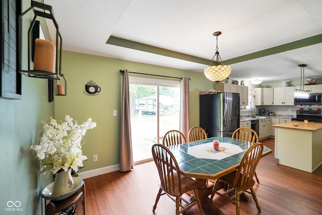 6020 E Smokey View Rd, Mooresville, IN 46158 - dining area featuring wood finished floors and baseboards