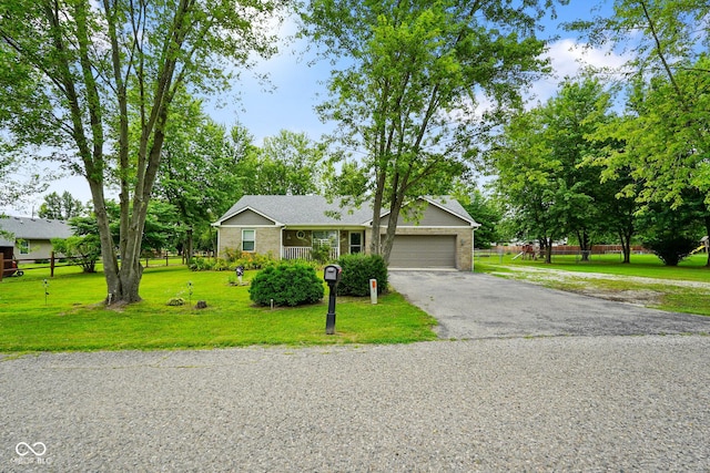 6020 E Smokey View Rd, Mooresville, IN 46158 - view of front of house with brick siding, an attached garage, and asphalt driveway