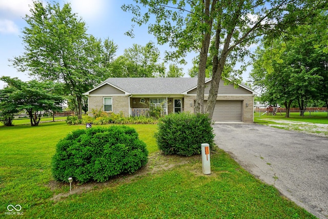 6020 E Smokey View Rd, Mooresville, IN 46158 - ranch-style home featuring an attached garage, asphalt driveway, brick siding, and a front yard