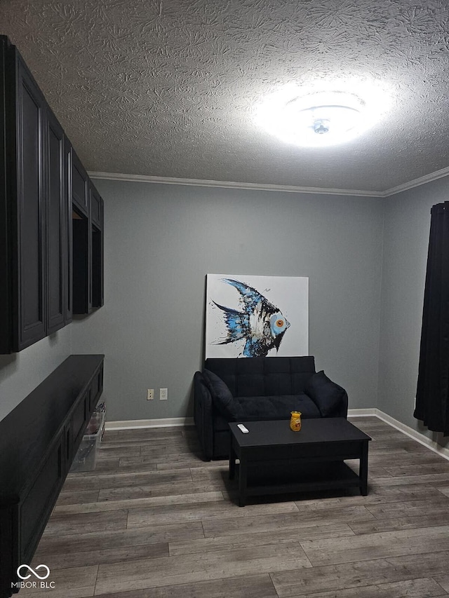 10450 Wintergreen Way, Indianapolis, IN 46234 - living area with a textured ceiling, crown molding, and dark wood-style floors