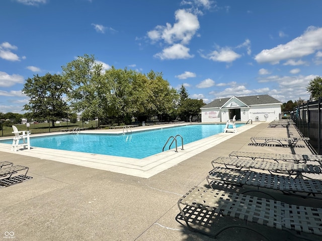 10450 Wintergreen Way, Indianapolis, IN 46234 - community pool featuring a patio area