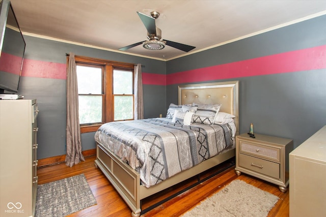 3459 W Michigan St, Indianapolis, IN 46222 - bedroom with wood finished floors, ceiling fan, and crown molding