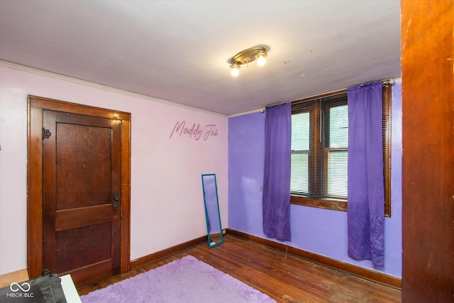 3459 W Michigan St, Indianapolis, IN 46222 - empty room with wood finished floors and baseboards