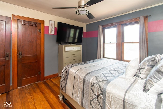 3459 W Michigan St, Indianapolis, IN 46222 - bedroom featuring wood finished floors, crown molding, and a ceiling fan