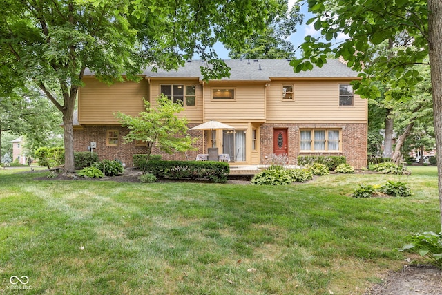 7621 Forest Dr, Fishers, IN 46038 - view of front facade with brick siding and a front lawn