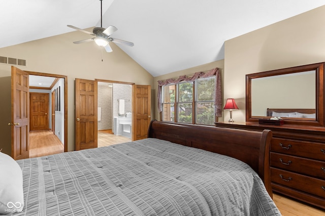 7621 Forest Dr, Fishers, IN 46038 - bedroom with high vaulted ceiling, light wood-type flooring, connected bathroom, and ceiling fan
