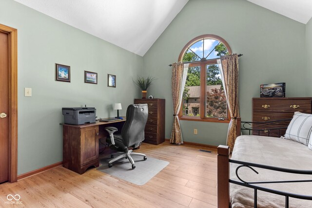 7621 Forest Dr, Fishers, IN 46038 - office area with light wood-style floors and high vaulted ceiling