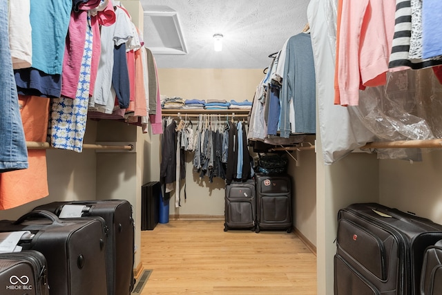 7621 Forest Dr, Fishers, IN 46038 - spacious closet featuring wood finished floors