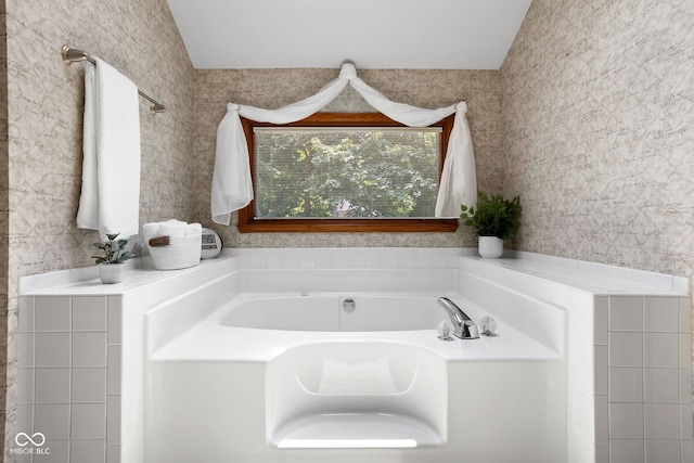 7621 Forest Dr, Fishers, IN 46038 - full bathroom with a garden tub and vaulted ceiling