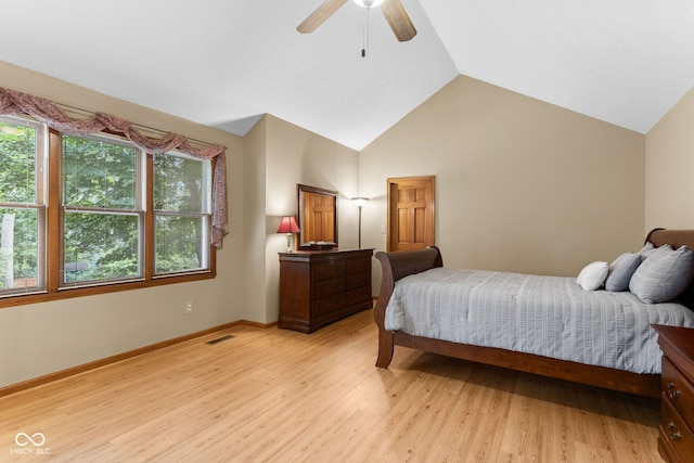 7621 Forest Dr, Fishers, IN 46038 - bedroom featuring light wood finished floors, ceiling fan, and high vaulted ceiling