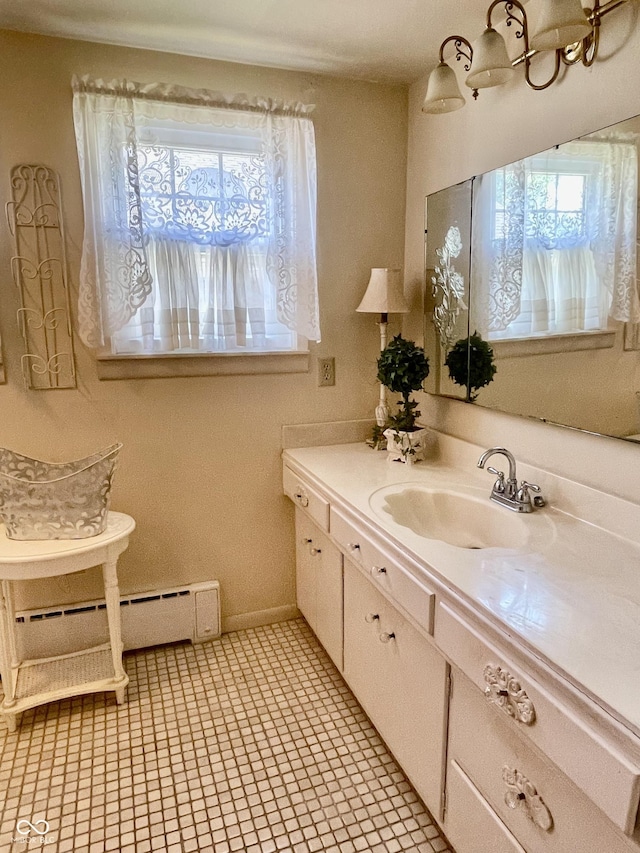 800 Walton Dr, Plainfield, IN 46168 - bathroom featuring a baseboard radiator, plenty of natural light, and vanity