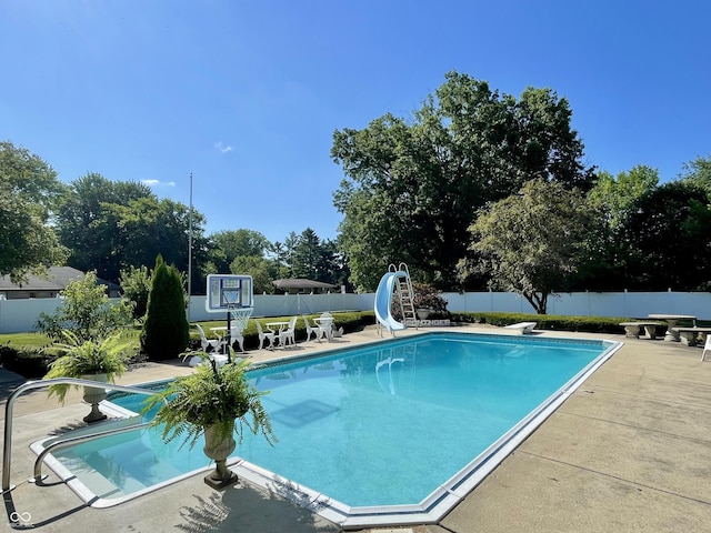 800 Walton Dr, Plainfield, IN 46168 - view of pool featuring a water slide, a fenced backyard, a patio area, and a diving board
