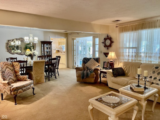 800 Walton Dr, Plainfield, IN 46168 - living room with light carpet, a chandelier, and a textured ceiling