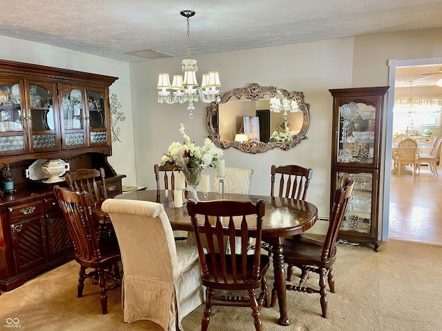 800 Walton Dr, Plainfield, IN 46168 - dining area with a chandelier, a textured ceiling, and light colored carpet