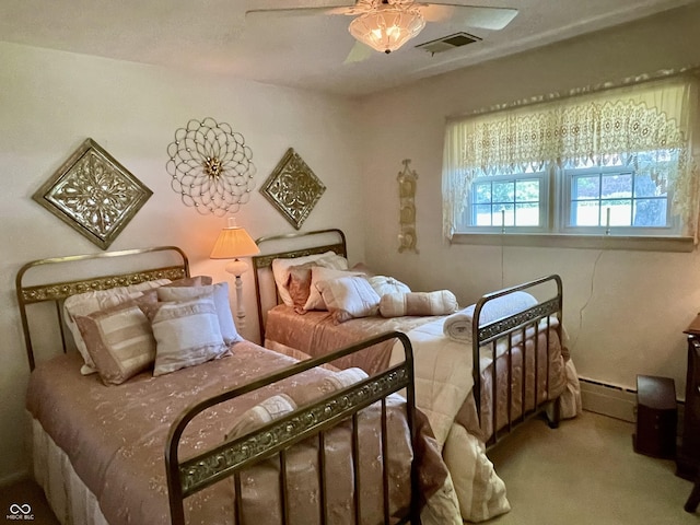 800 Walton Dr, Plainfield, IN 46168 - carpeted bedroom with baseboard heating and ceiling fan