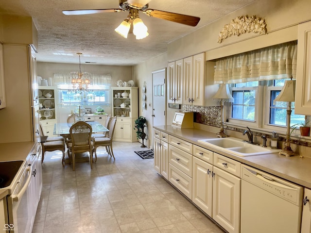 800 Walton Dr, Plainfield, IN 46168 - kitchen with white appliances, ceiling fan, light countertops, a textured ceiling, and a chandelier